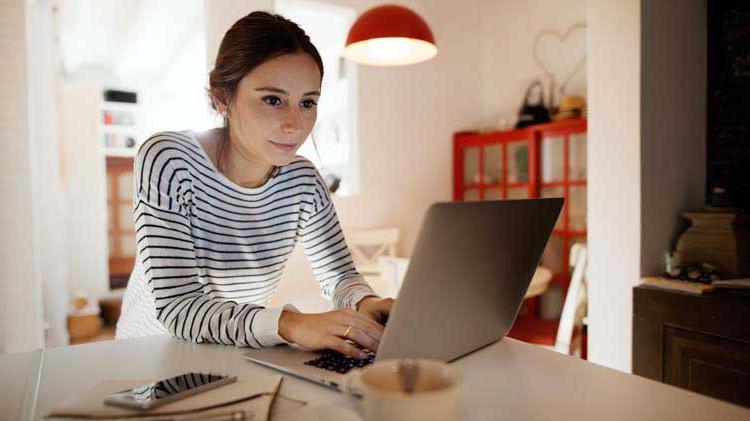 Budget minded girl on her laptop.