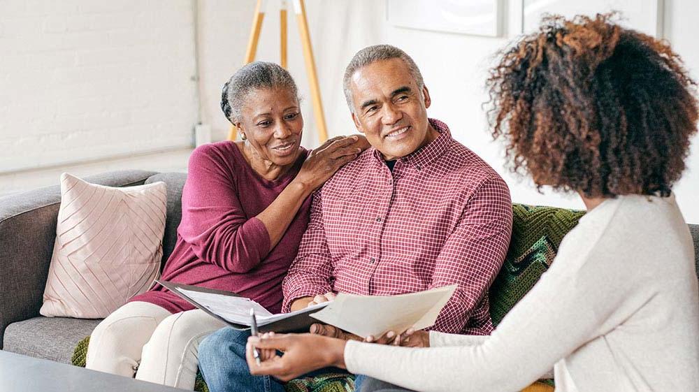 Couple discussing estate planning.