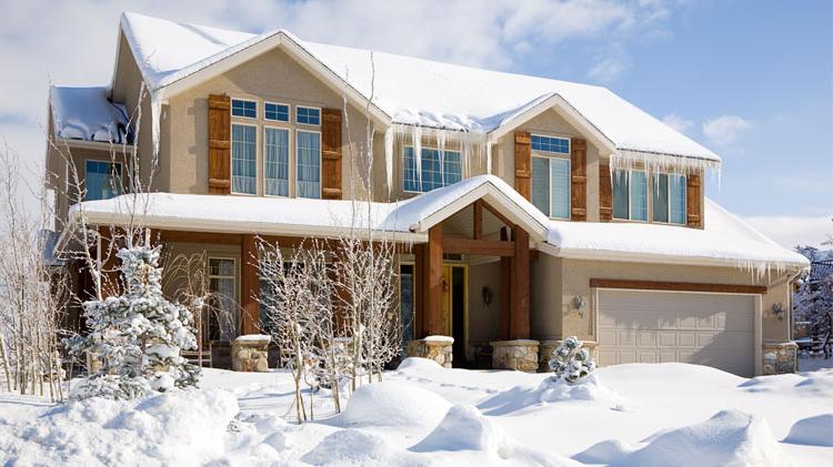 House surrounded by snow.